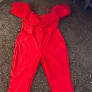 Red jump suit